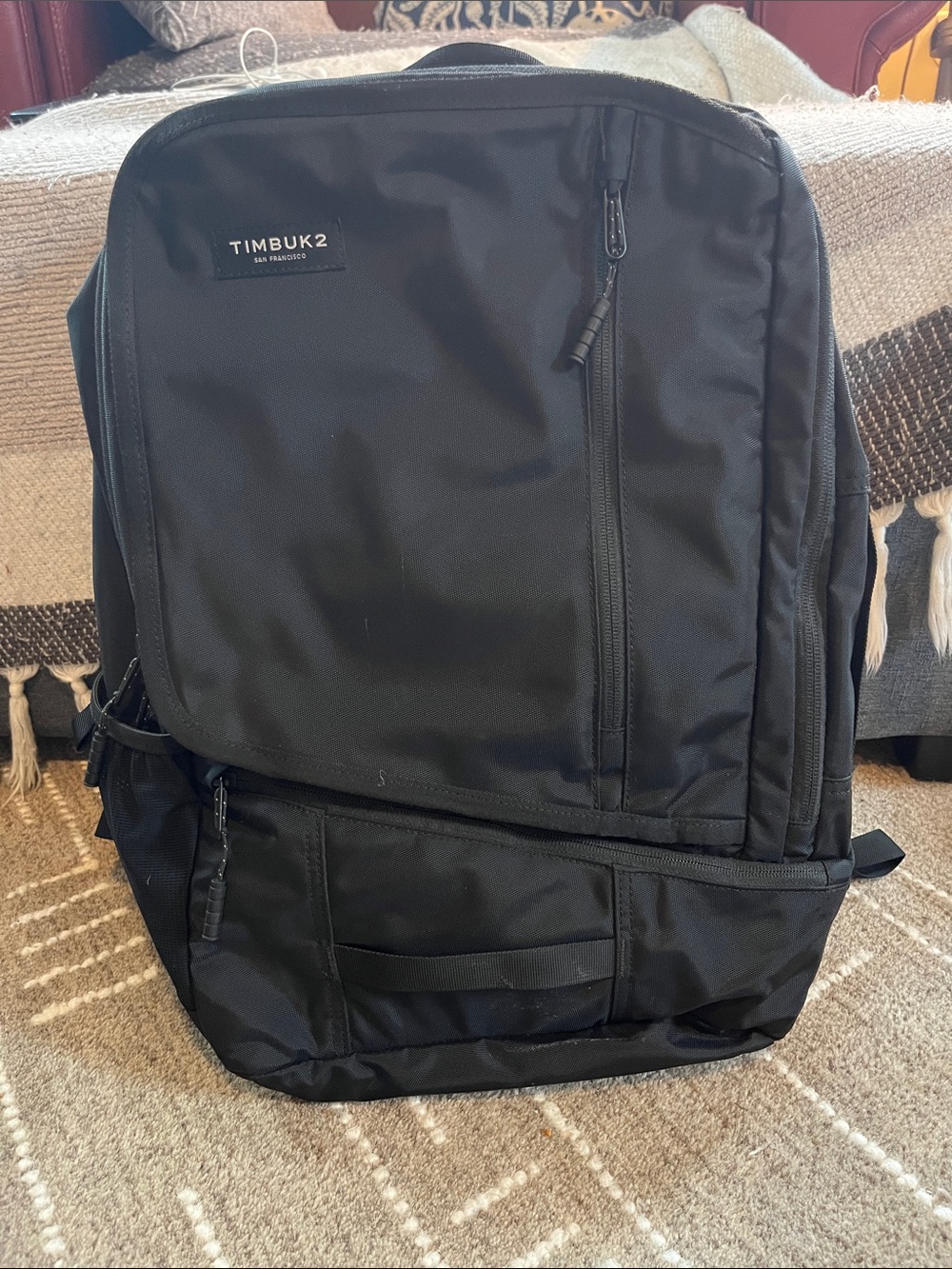 Timbuk2 Black Men's Backpack with  padded laptop compartment.